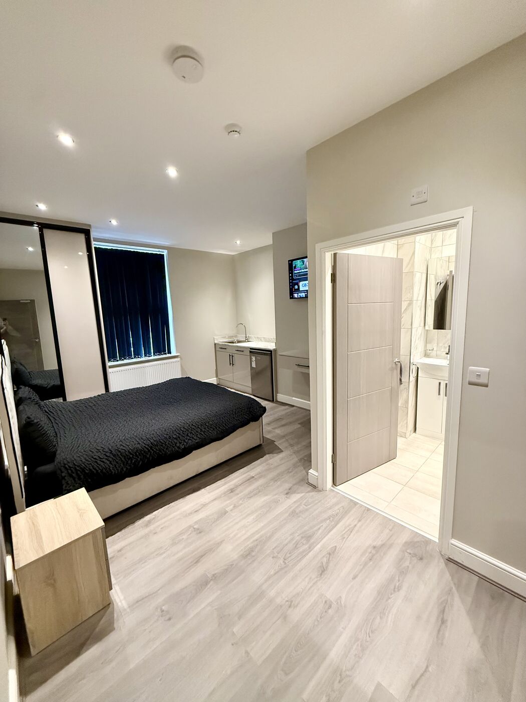 A studio room with a private kitchenette